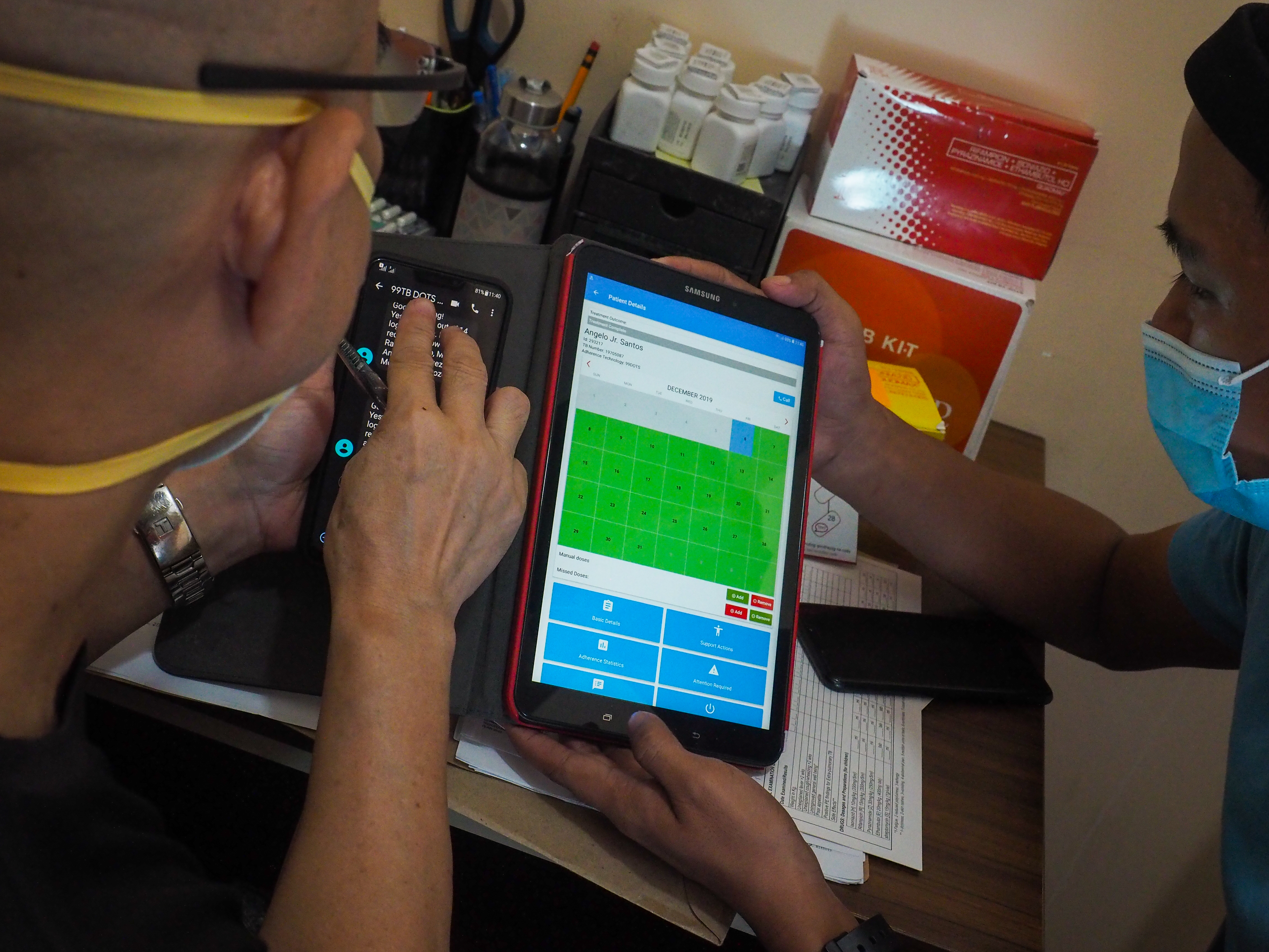 Adherence platform seen in tablet. Image showing healthcare providers reviewing the adherence rates.